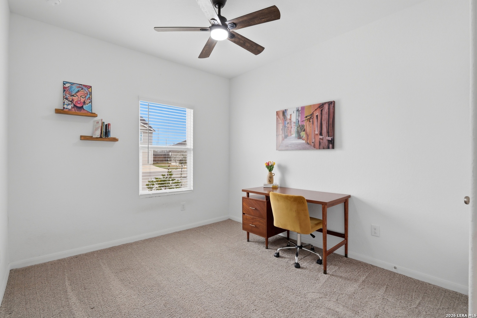 14919 Rhyolite Way Elmendorf, TX 78112 - Photo 16 of 26 a workspace with a window