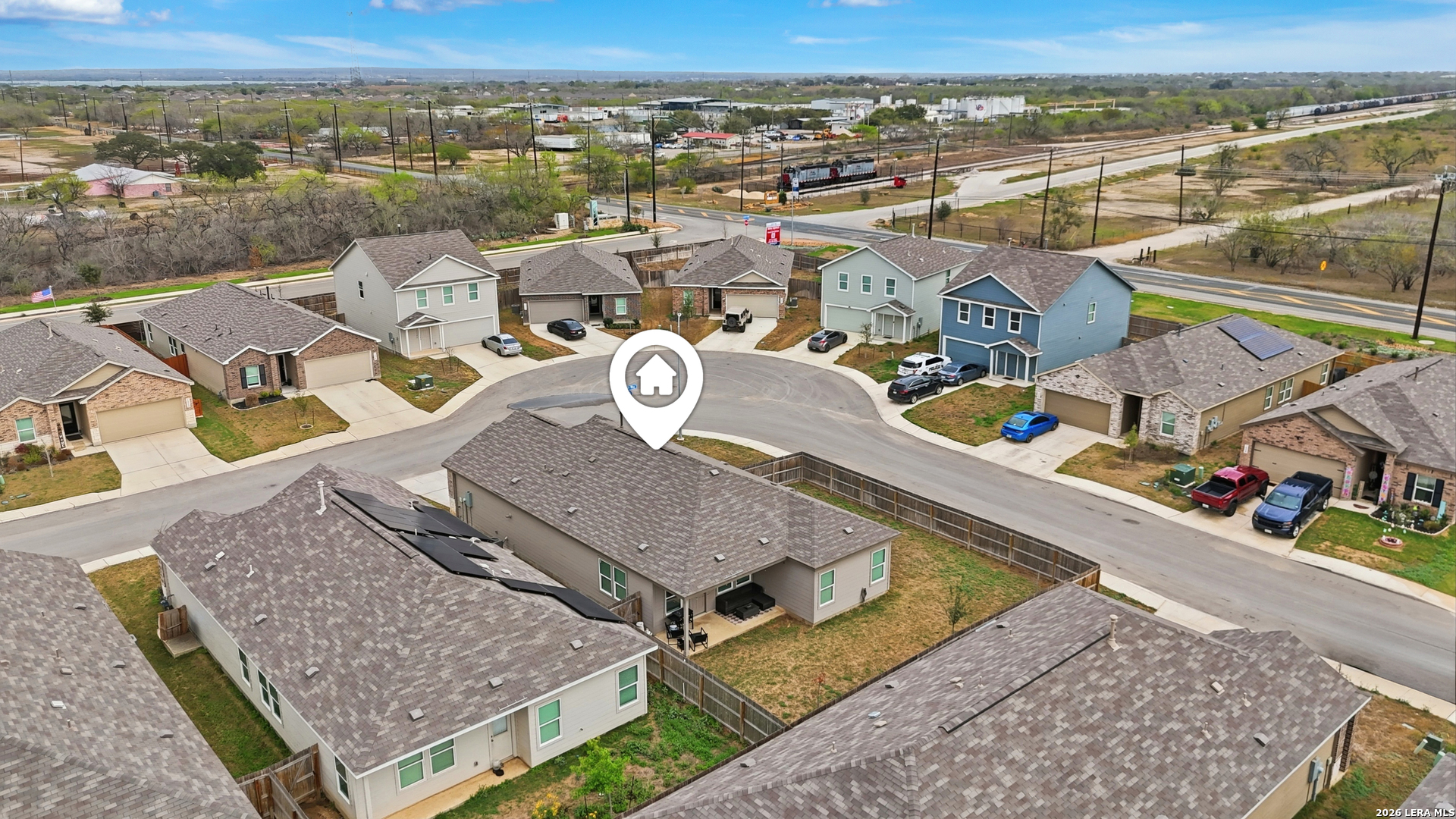 14919 Rhyolite Way Elmendorf, TX 78112 - Photo 23 of 26 an aerial view of a house with a ocean view