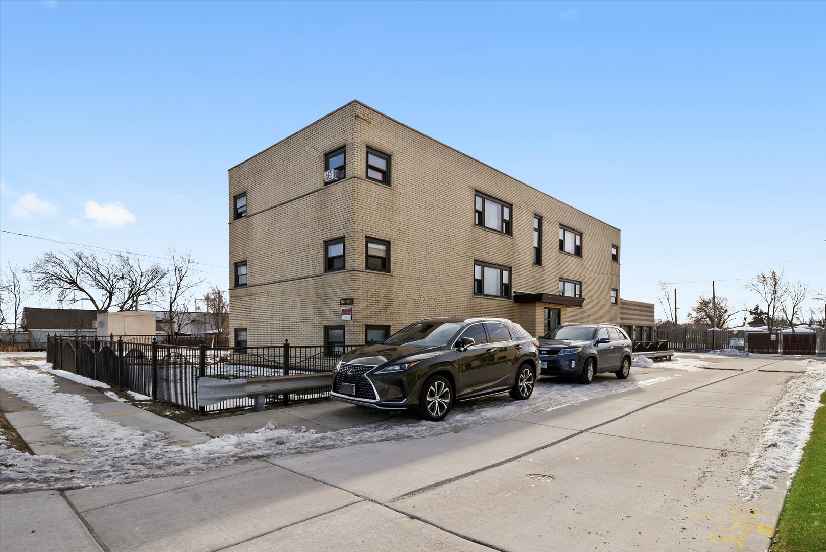 5701 West 55th Street, Unit 1S Chicago, IL 60638 - Photo 14 of 18 a view of car parked in front of house