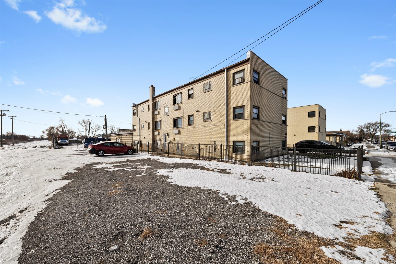 5701 West 55th Street, Unit 1S Chicago, IL 60638 - Photo 16 of 18 a view of a street with cars