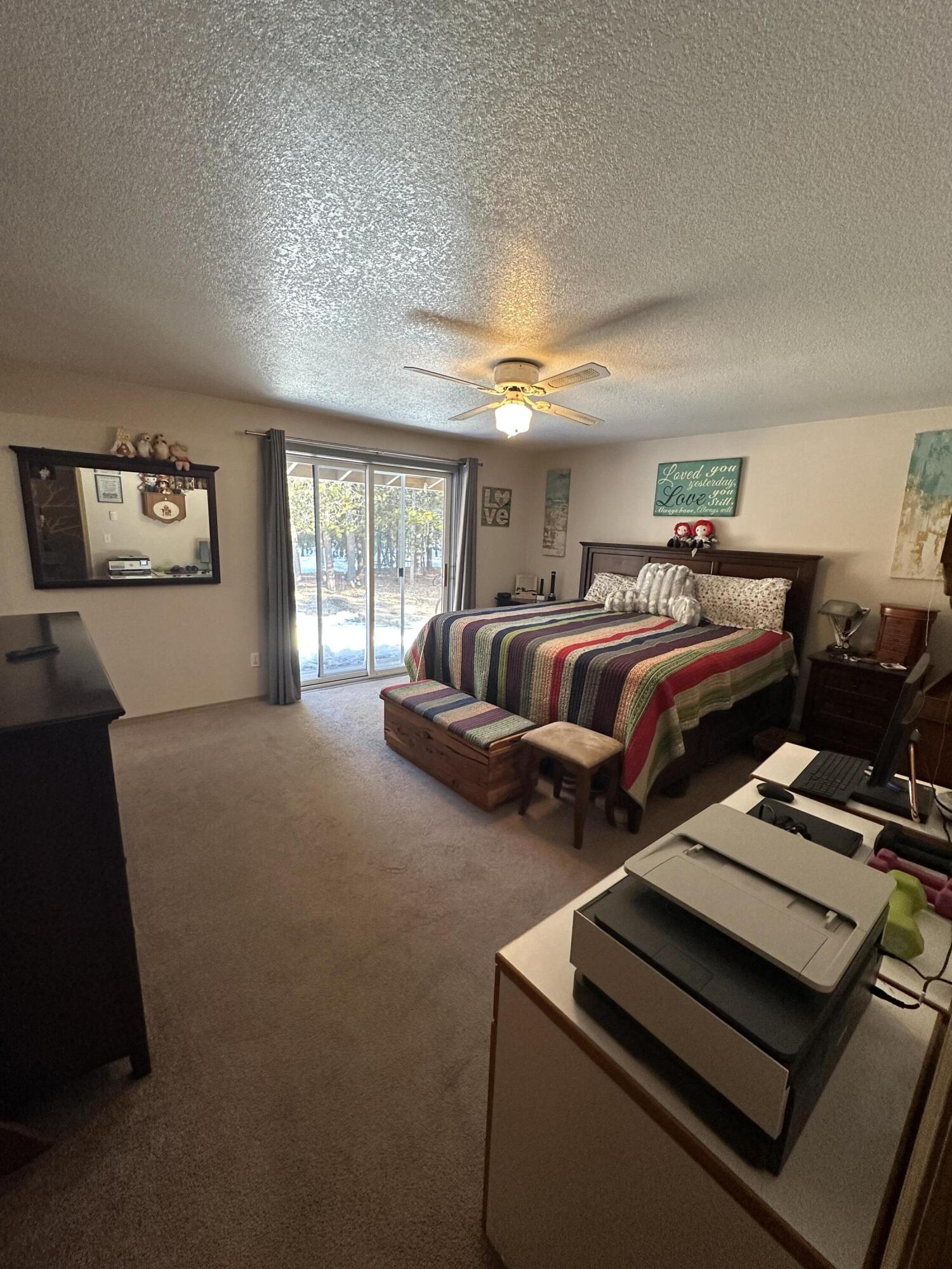 123977 Surveyor Road Crescent Lake, OR 97733 - Photo 35 of 41 a bedroom with bed and window