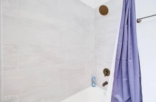 a bathroom with a bathtub