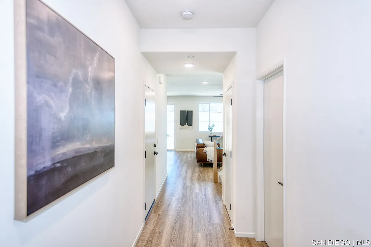 229 Paddock Lane Fallbrook, CA 92028 - Photo 3 of 33 a view of living room filled with furniture and wooden floor