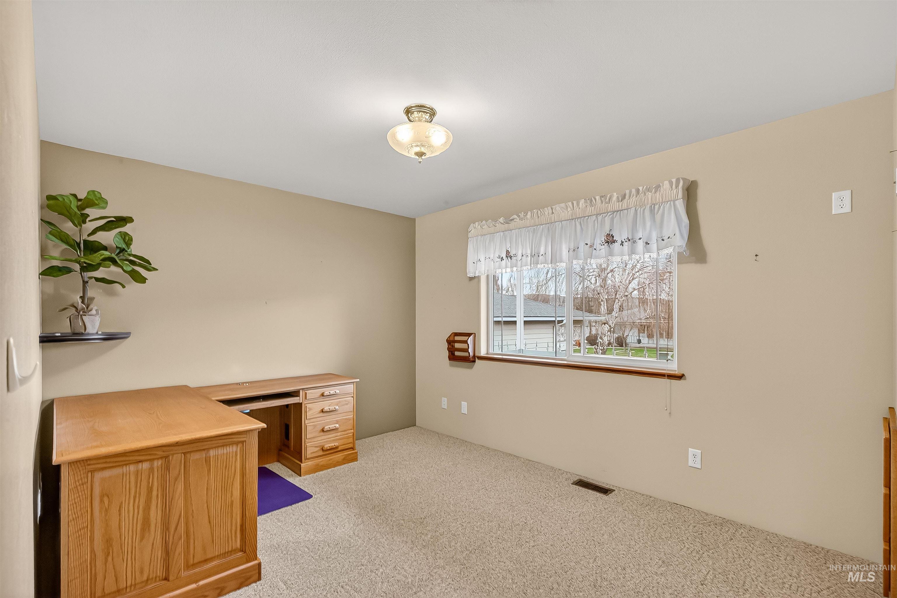 1324 Setlow Court Clarkston, WA 99403 - Photo 22 of 49 Home office with light colored carpet