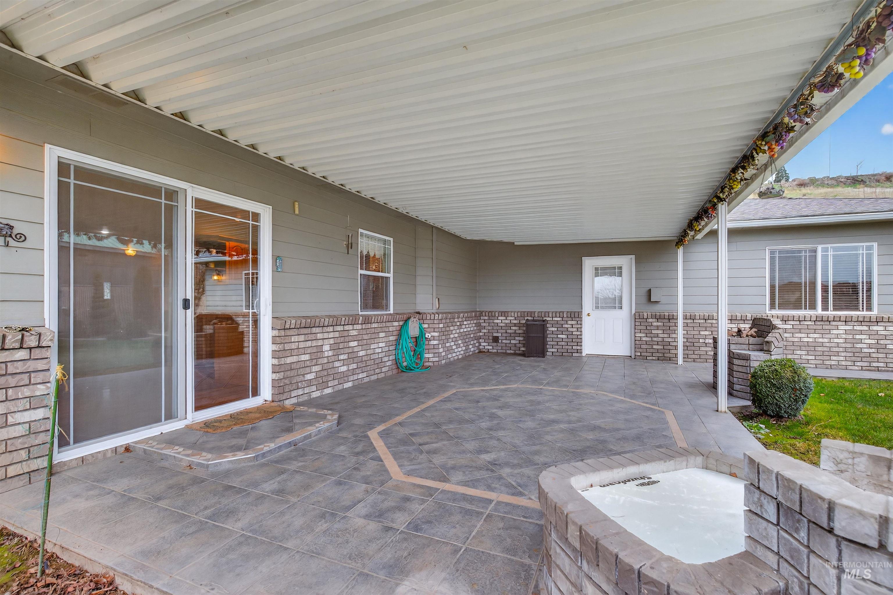 1324 Setlow Court Clarkston, WA 99403 - Photo 34 of 49 View of patio / terrace with an outdoor hot tub