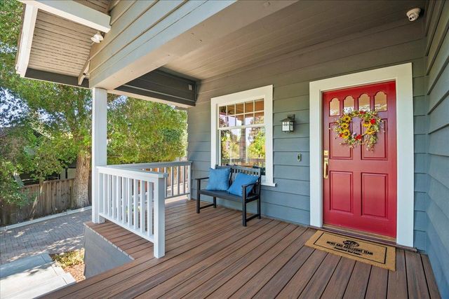a view of two chairs in the balcony