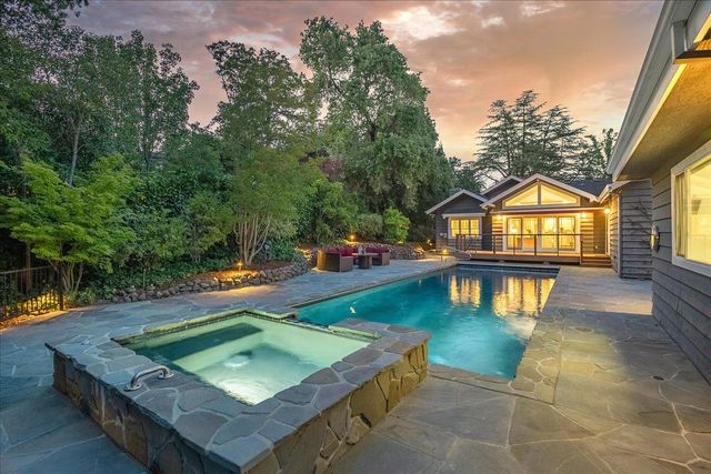 swimming pool with outdoor seating