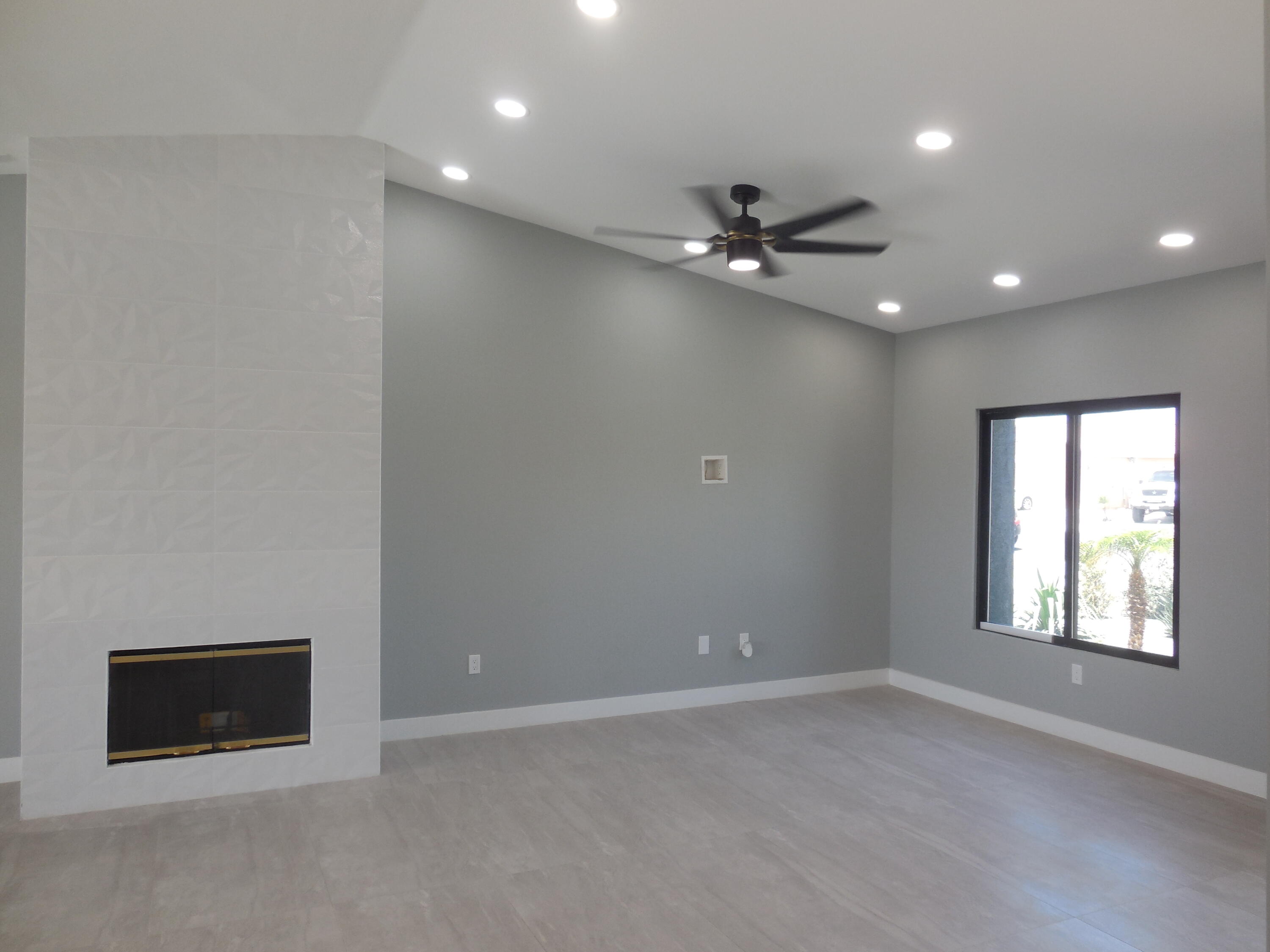 83389 Calypso Circle Indio, CA 92201 - Photo 13 of 45 an empty room with a ceiling fan and window