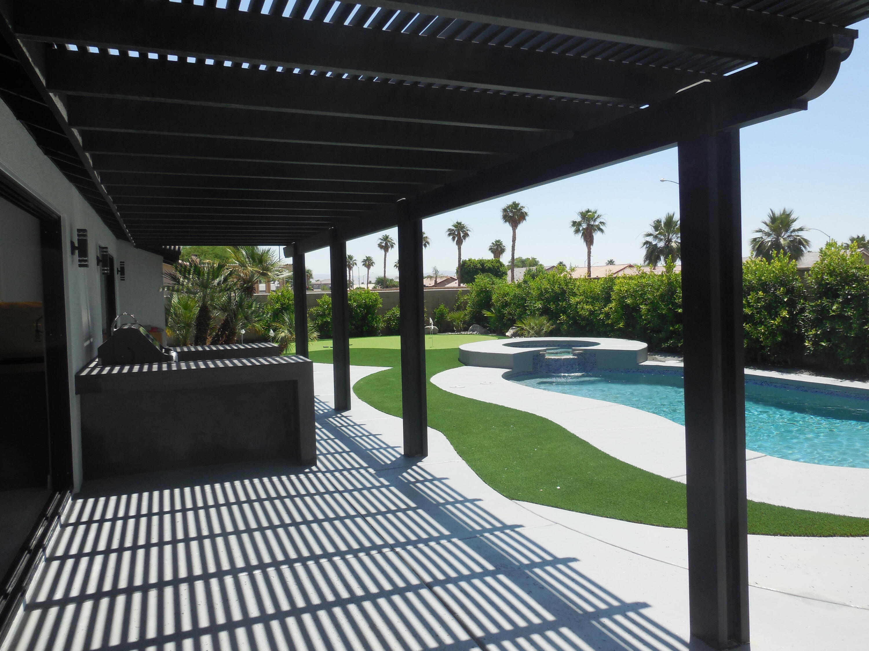 83389 Calypso Circle Indio, CA 92201 - Photo 35 of 45 a view of a porch with wooden floor