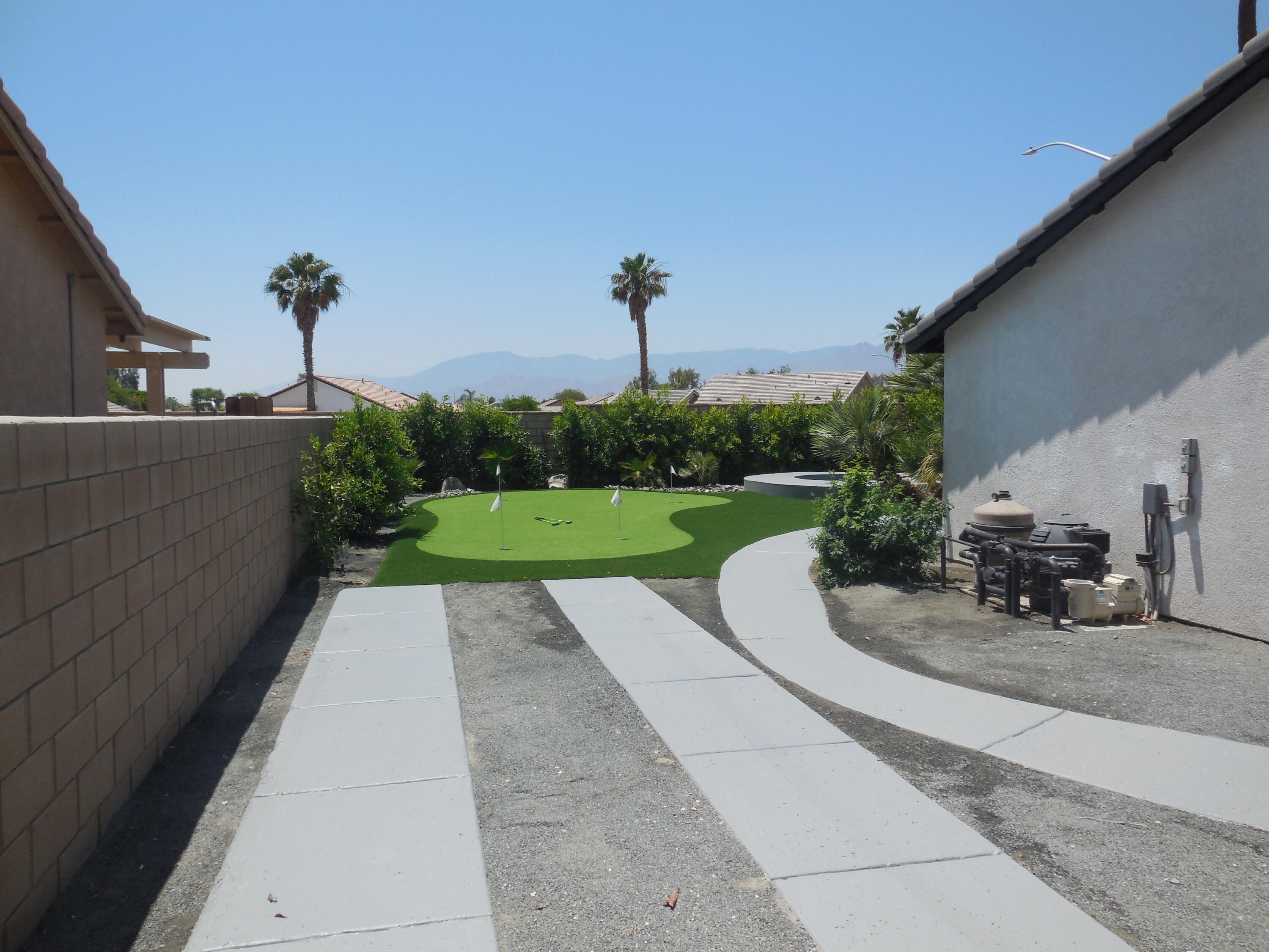 83389 Calypso Circle Indio, CA 92201 - Photo 43 of 45 a view of a park with plants and a bench