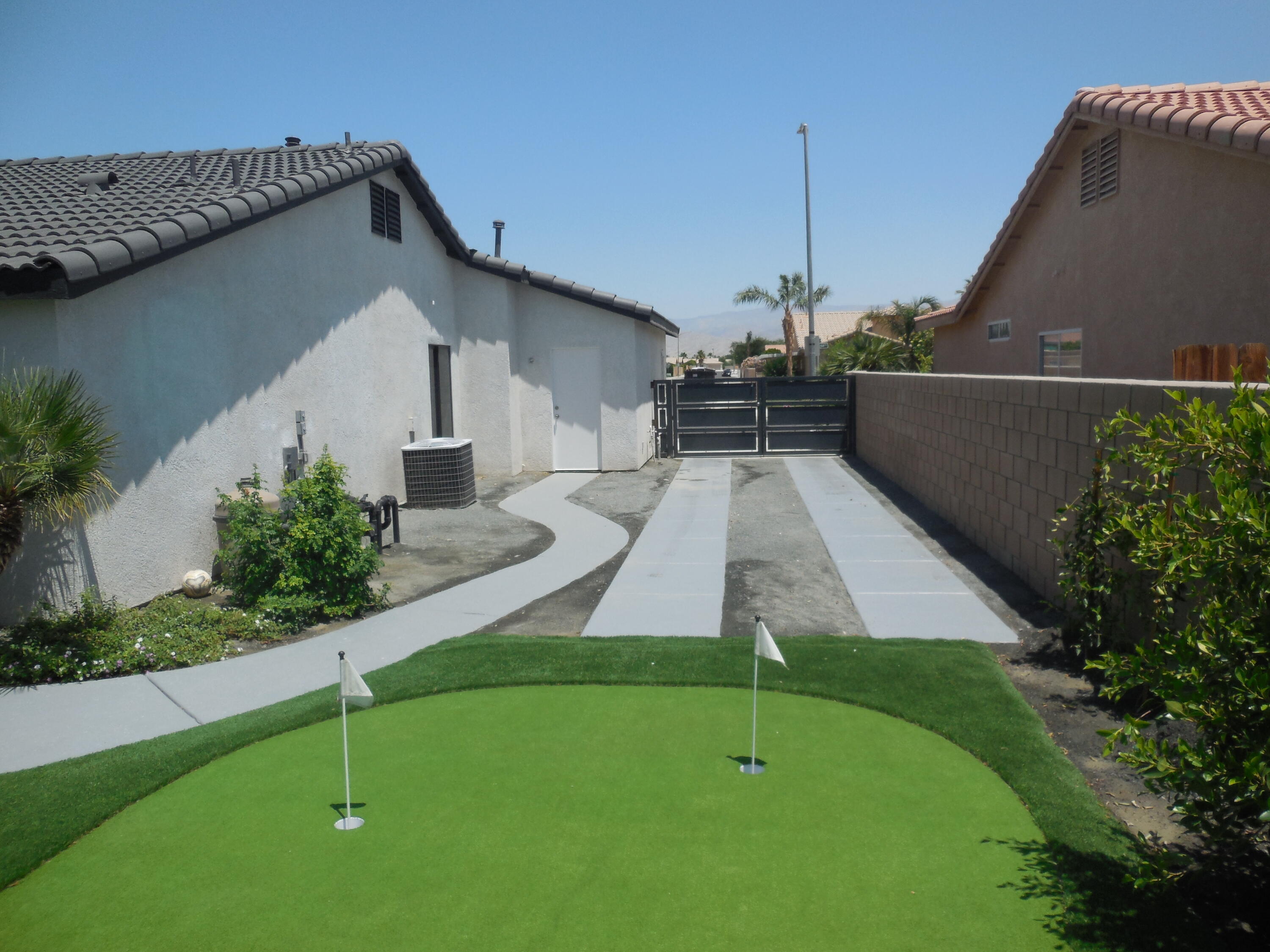 83389 Calypso Circle Indio, CA 92201 - Photo 44 of 45 a view of a house with a yard
