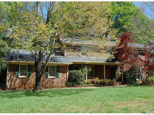 3328 Thomas Road Raleigh, NC 27607 - Photo 1 of 3 front view of a house with a yard