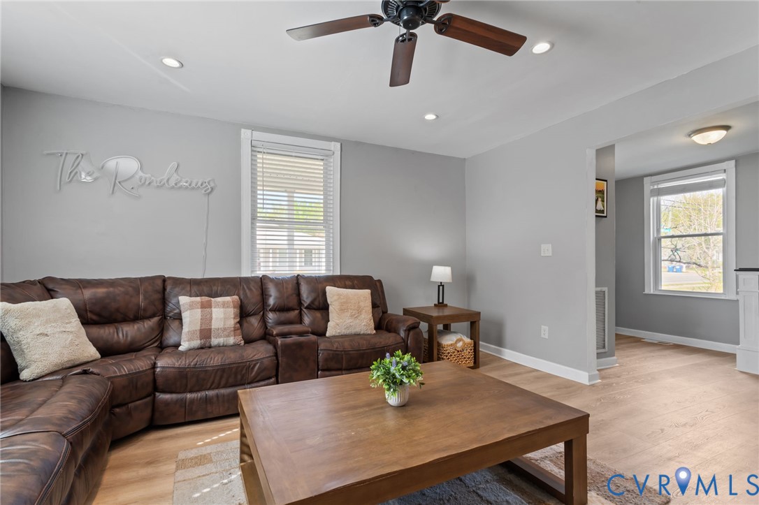 6101 River Road Petersburg, VA 23803 - Photo 9 of 37 Living room featuring LVP floors, a ceiling fan, a