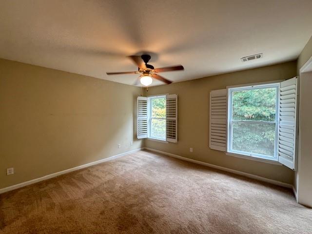 419 Grayson Way Alpharetta, GA 30004 - Photo 12 of 16 a view of room with window and ceiling fan