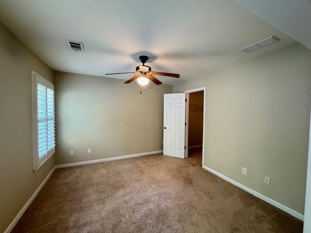 419 Grayson Way Alpharetta, GA 30004 - Photo 13 of 16 a view of a livingroom with a ceiling fan and window