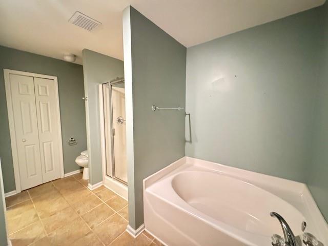 419 Grayson Way Alpharetta, GA 30004 - Photo 16 of 16 a bathroom with a bathtub and a shower