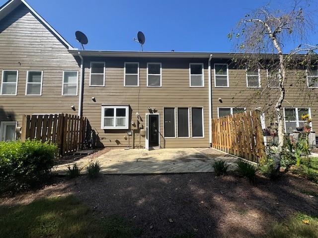 419 Grayson Way Alpharetta, GA 30004 - Photo 3 of 16 a front view of a house with a yard
