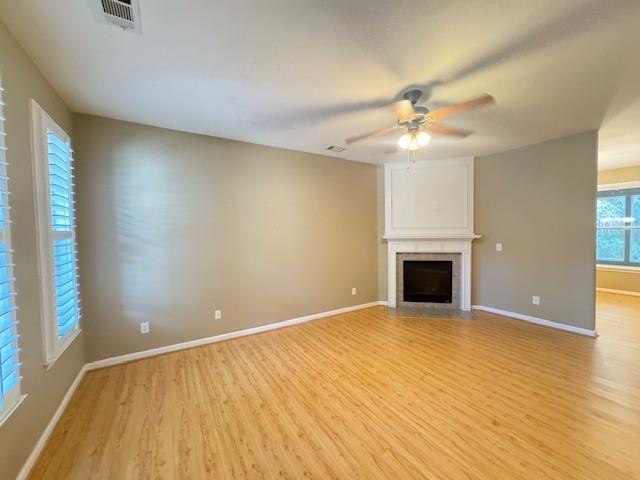 419 Grayson Way Alpharetta, GA 30004 - Photo 4 of 16 wooden floor in an empty room with a fireplace and a window