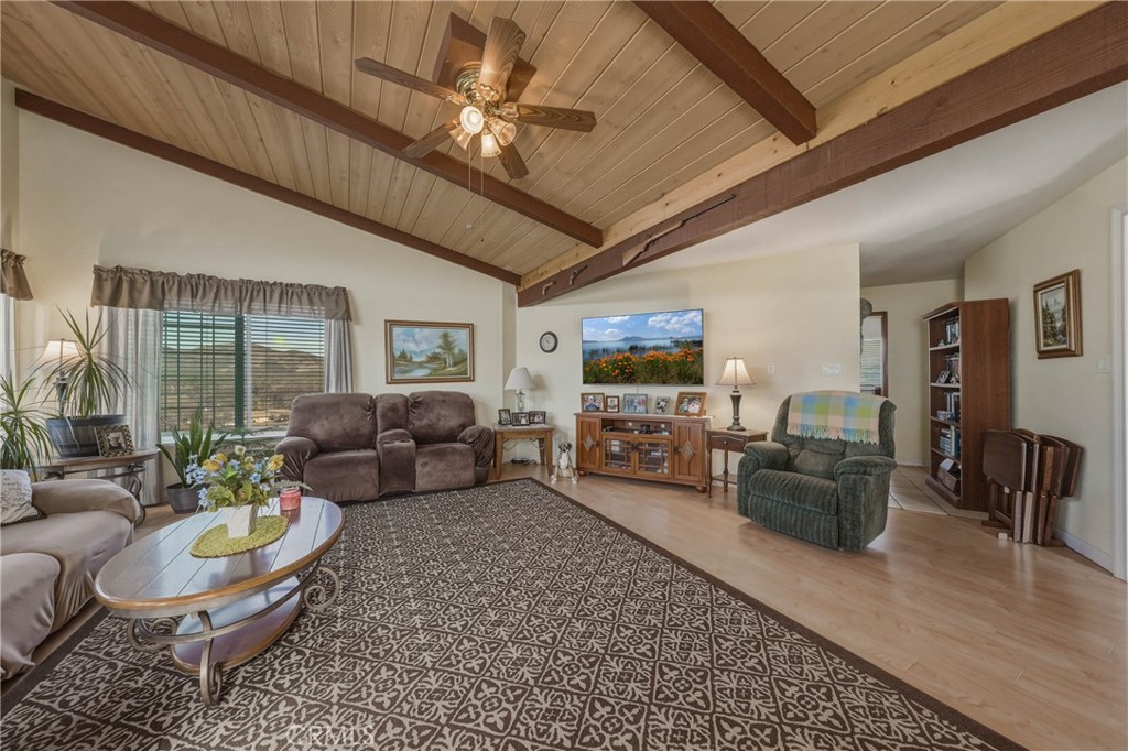 3245 Ackley Road Lakeport, CA 95453 - Photo 3 of 16 a living room with furniture and a flat screen tv