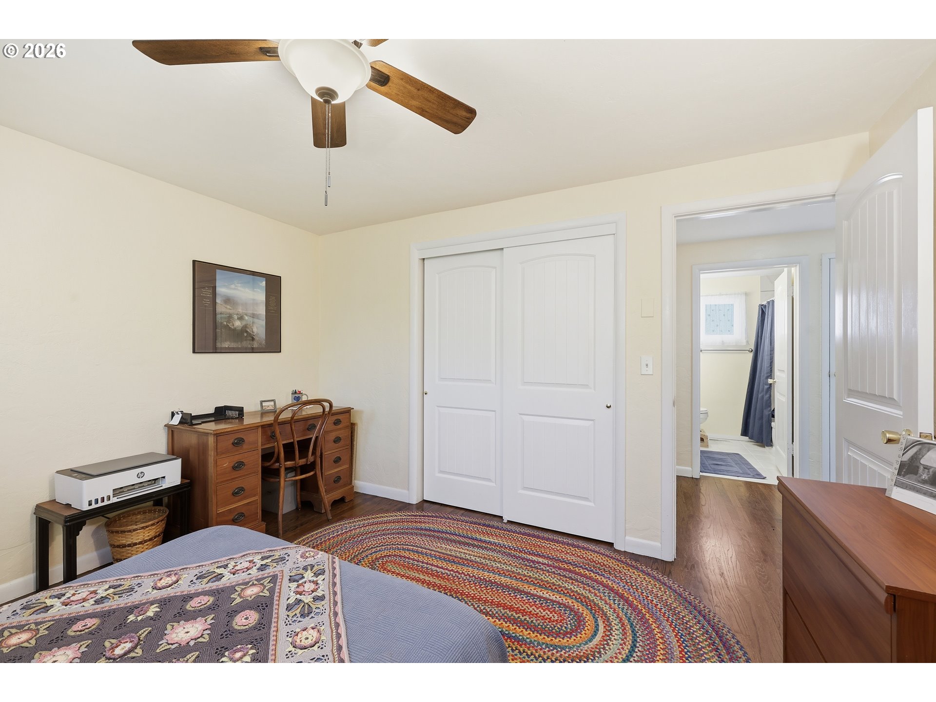 65 Greenvale Drive Springfield, OR 97477 - Photo 26 of 42 a bedroom with furniture and wooden floor