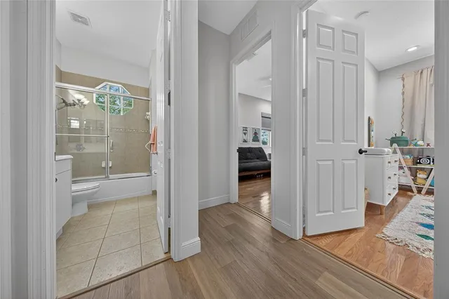 a utility room with sink dryer and washer