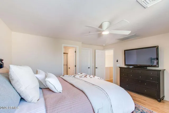 a bathroom with a sink vanity and a mirror