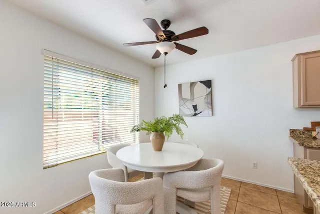 a kitchen with stainless steel appliances granite countertop a stove microwave and refrigerator