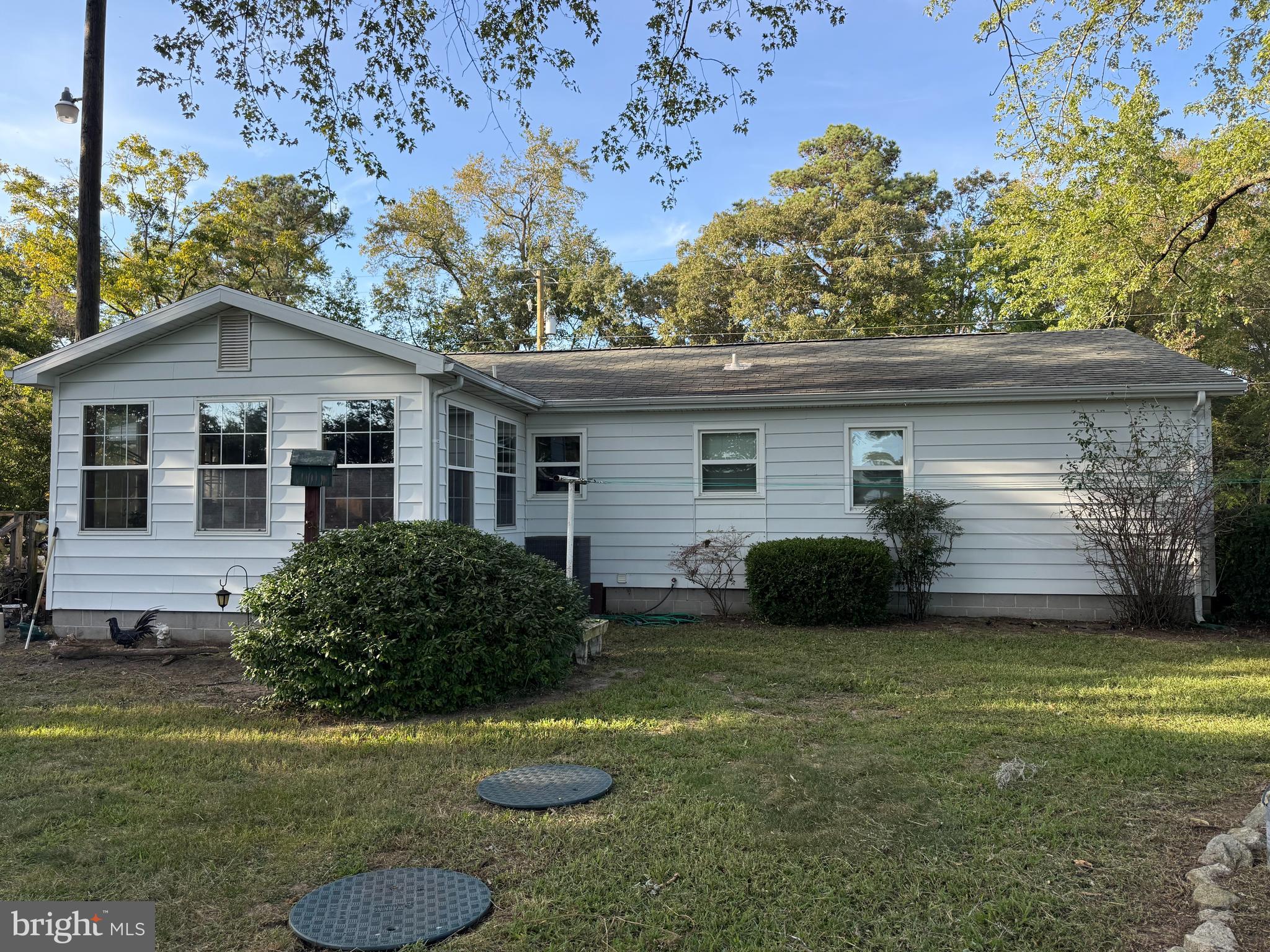 7132 Airport Road Laurel, DE 19956 - Photo 11 of 37 a view of a house with a yard