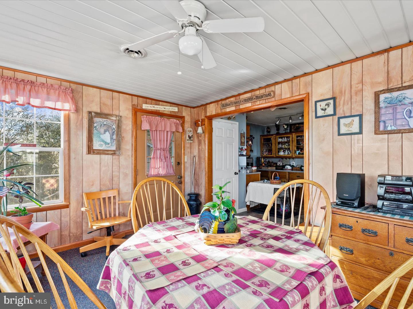 7132 Airport Road Laurel, DE 19956 - Photo 29 of 37 a bedroom with a bed and wooden floor