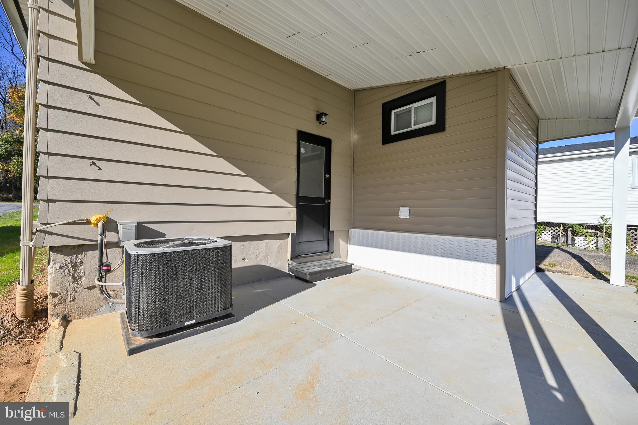 Concrete Patio in Rear