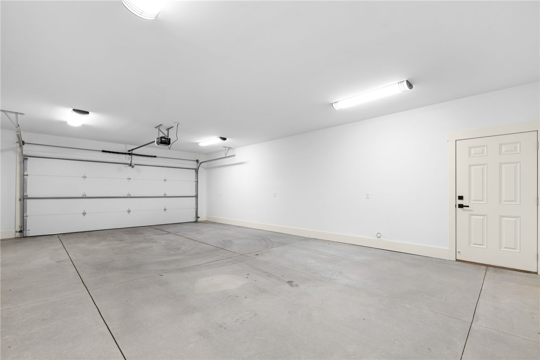 147 McAlister Road West Union, SC 29696 - Photo 29 of 50 A spacious and clean concrete floor highlights this functional vehicle storage area.