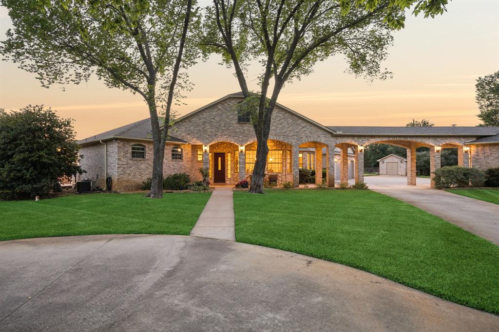 1135 Copper Canyon Road Copper Canyon, TX 76226 - Photo 3 of 40 Elegant Copper Canyon Estate Surrounded by Mature Trees on Two Landscaped Acres