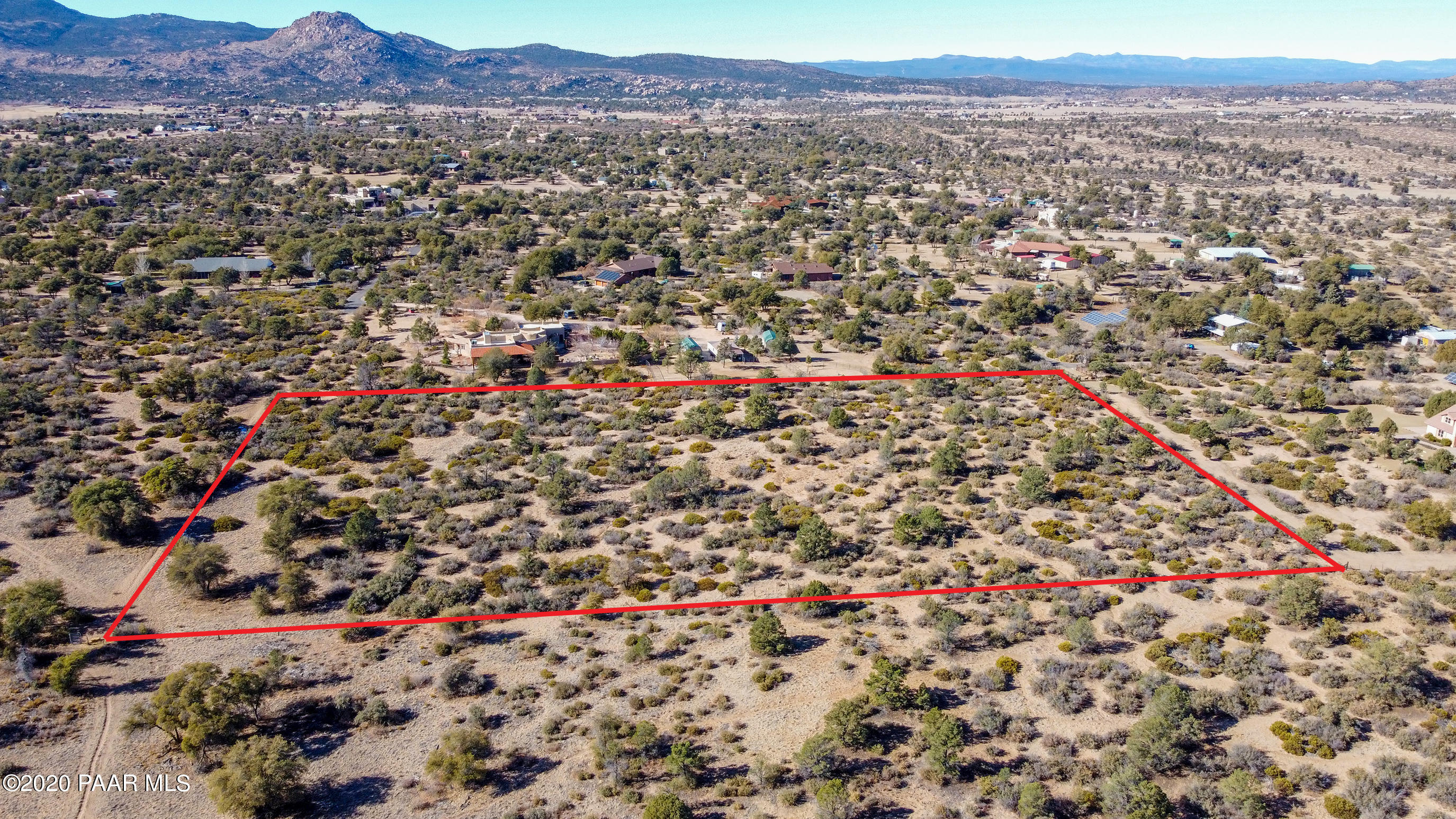 3040 West Oso Road Prescott, AZ 86305 - Photo 7 of 11 an aerial view of a house with a yard and mountain view in back