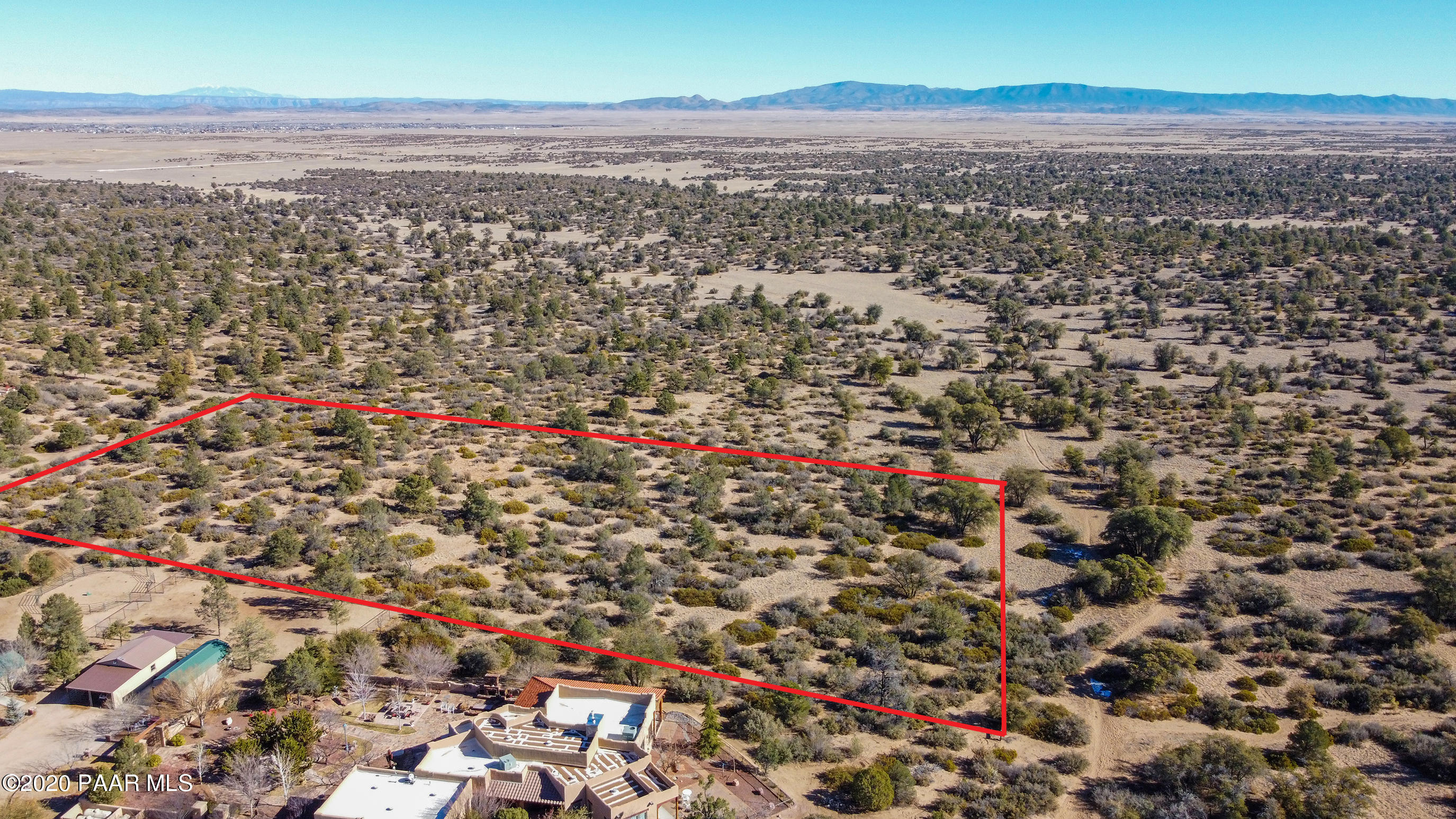 3040 West Oso Road Prescott, AZ 86305 - Photo 9 of 11 an aerial view of house with yard and mountain in background