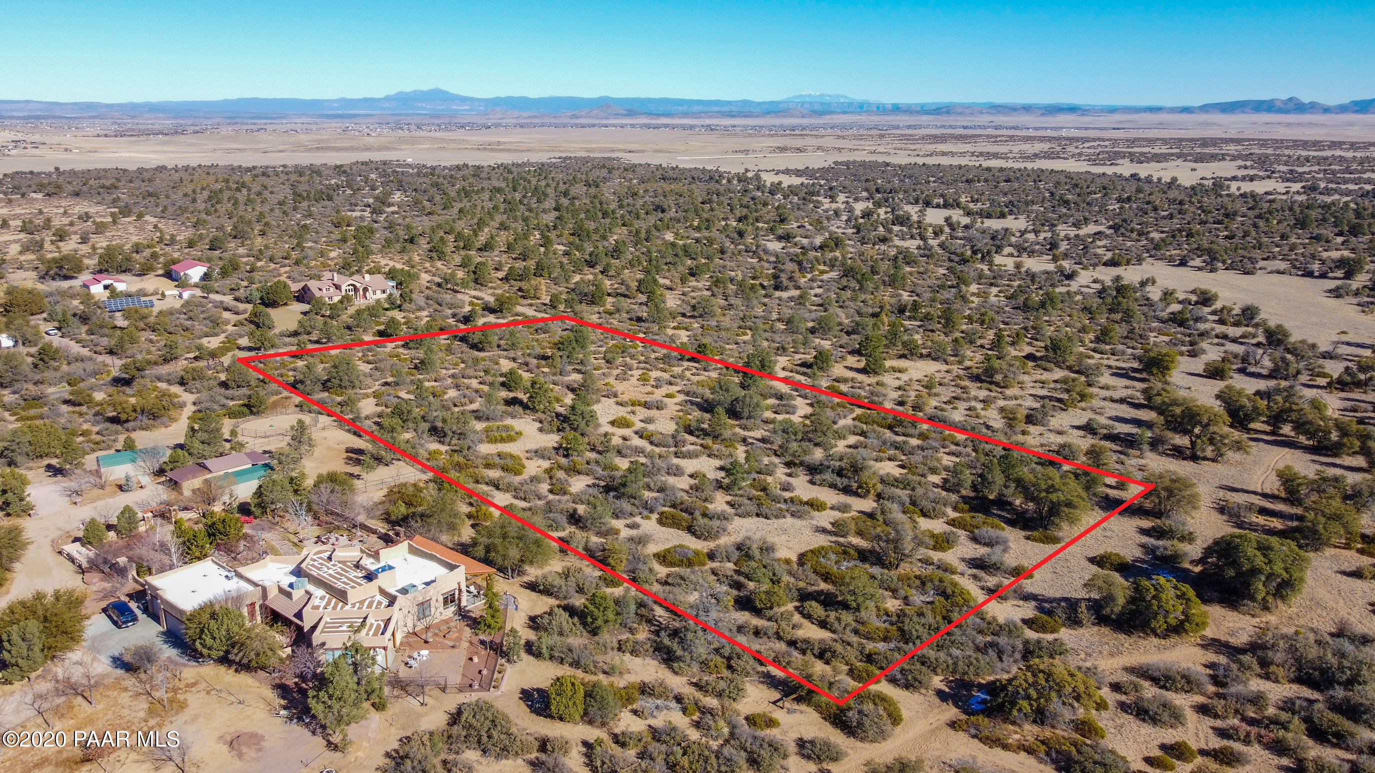 3040 West Oso Road Prescott, AZ 86305 - Photo 10 of 11 an aerial view of house with yard and mountain in background