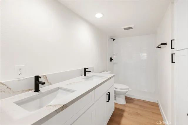 a bathroom with a sink and a toilet