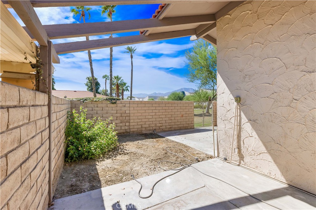 82151 Waring Way Indio, CA 92201 - Photo 20 of 22 a view of a backyard