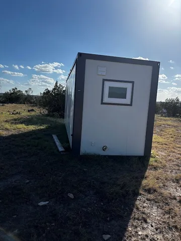 a view of an ocean and mountain