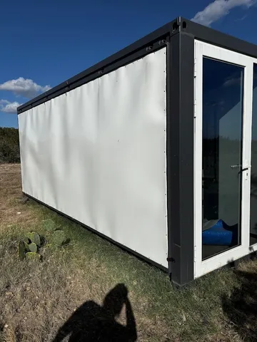 a view of a back yard of the house