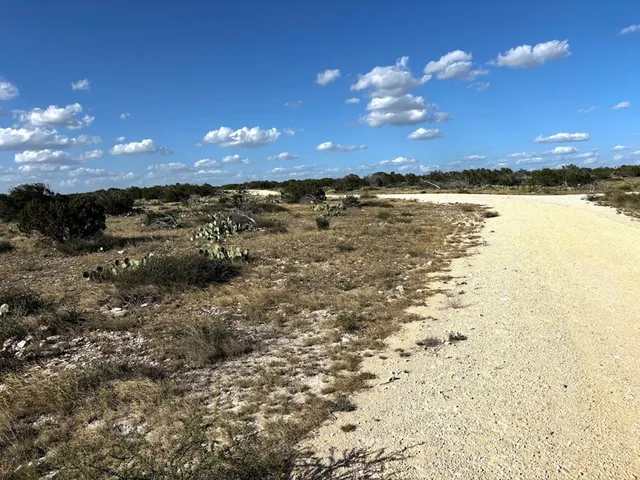 a view of yard with an outdoor space