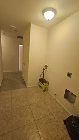 a bathroom with a toilet a sink and bathtub