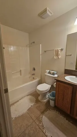 a view of room with furniture and a window