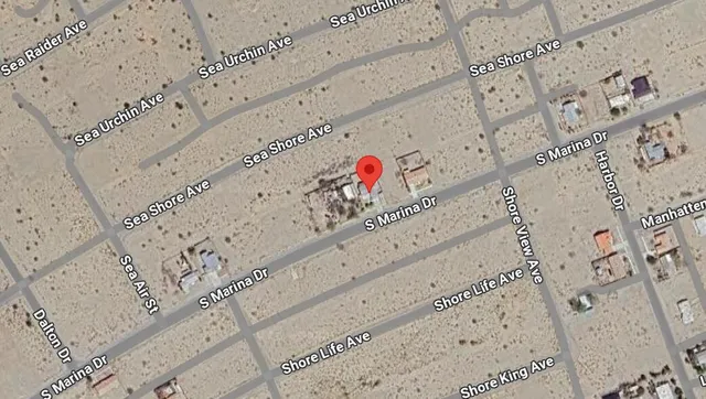 a sign that is on the side of a street