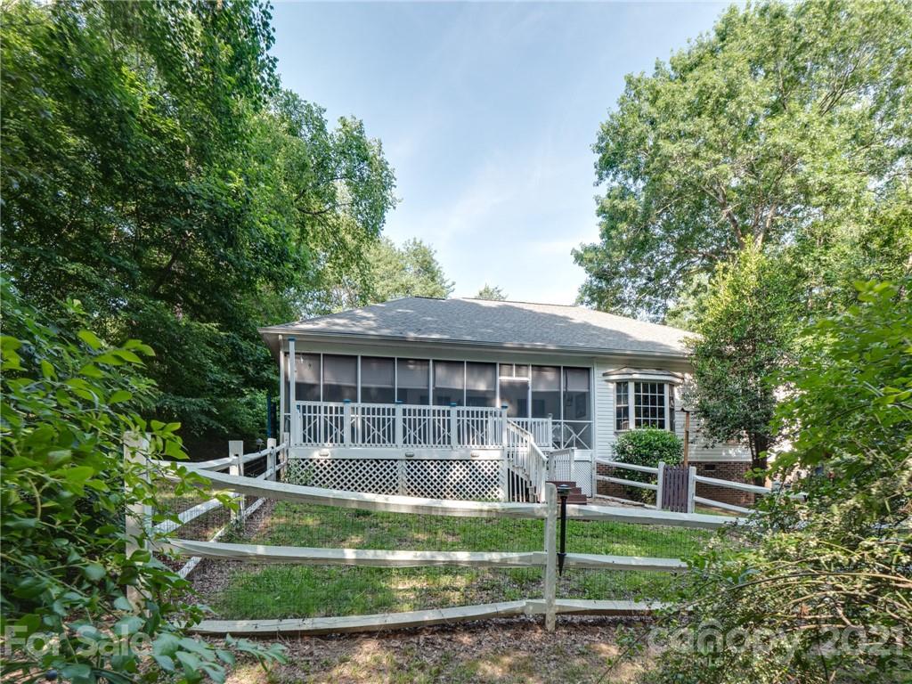 9141 Sunrise Meadow Road Fort Mill, SC 29715 - Photo 2 of 45 a view of a house with backyard and sitting area