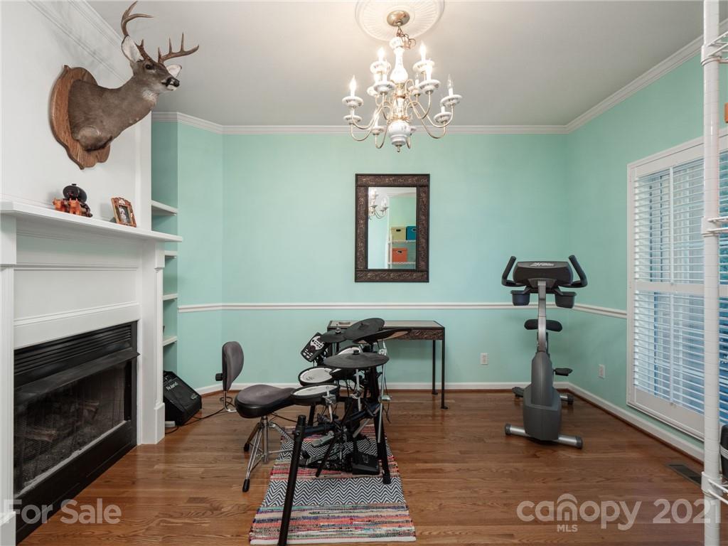 9141 Sunrise Meadow Road Fort Mill, SC 29715 - Photo 11 of 45 a view of a livingroom with furniture and a chandelier