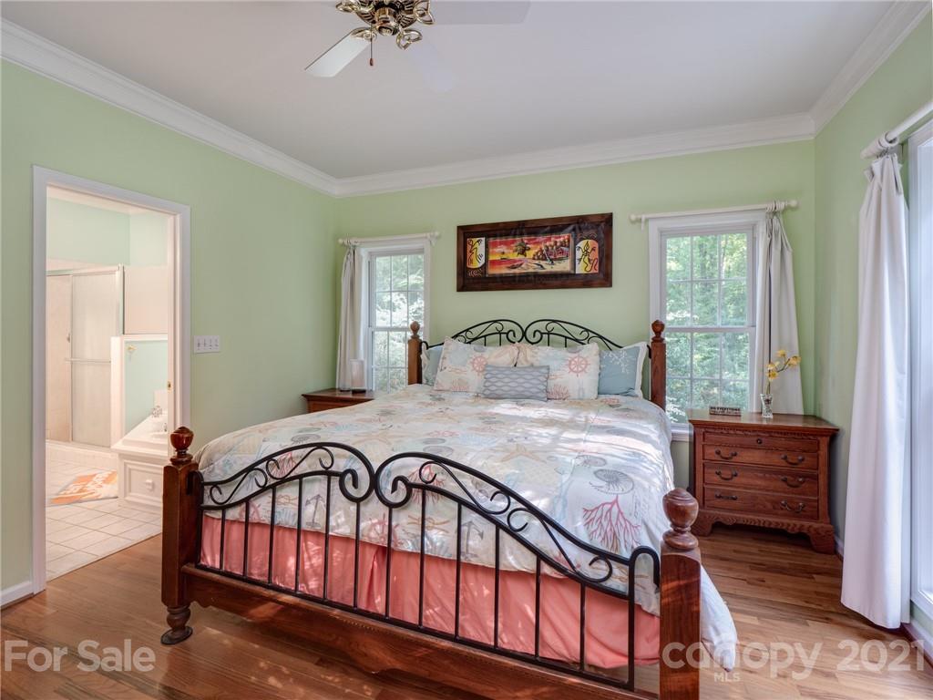 9141 Sunrise Meadow Road Fort Mill, SC 29715 - Photo 23 of 45 a bedroom with a bed and a window