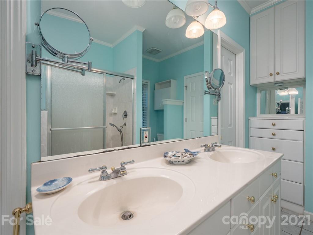 9141 Sunrise Meadow Road Fort Mill, SC 29715 - Photo 25 of 45 a bathroom with a double vanity sink and a mirror