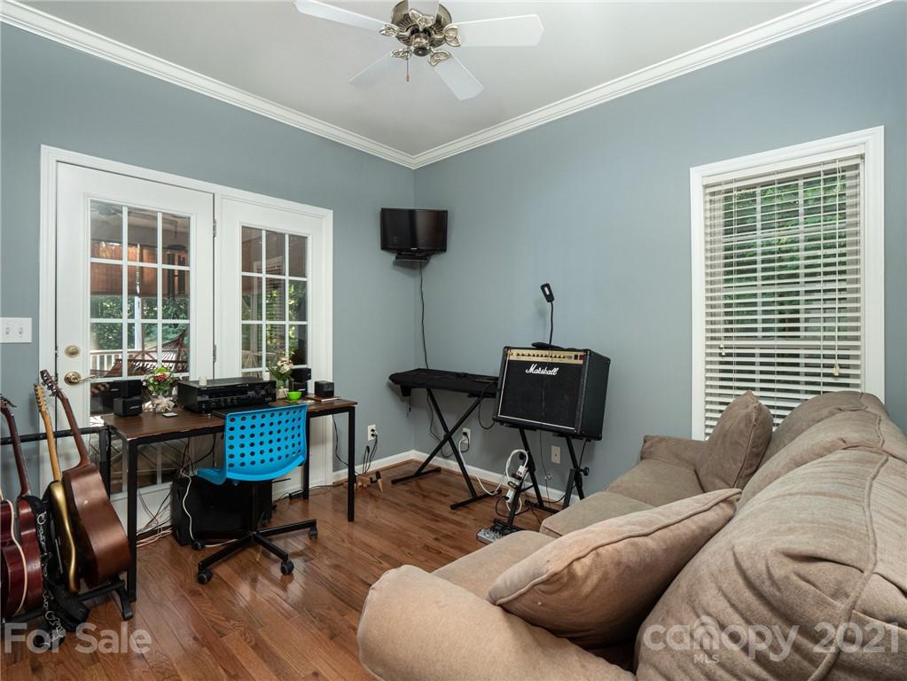 9141 Sunrise Meadow Road Fort Mill, SC 29715 - Photo 28 of 45 a living room with furniture and a window