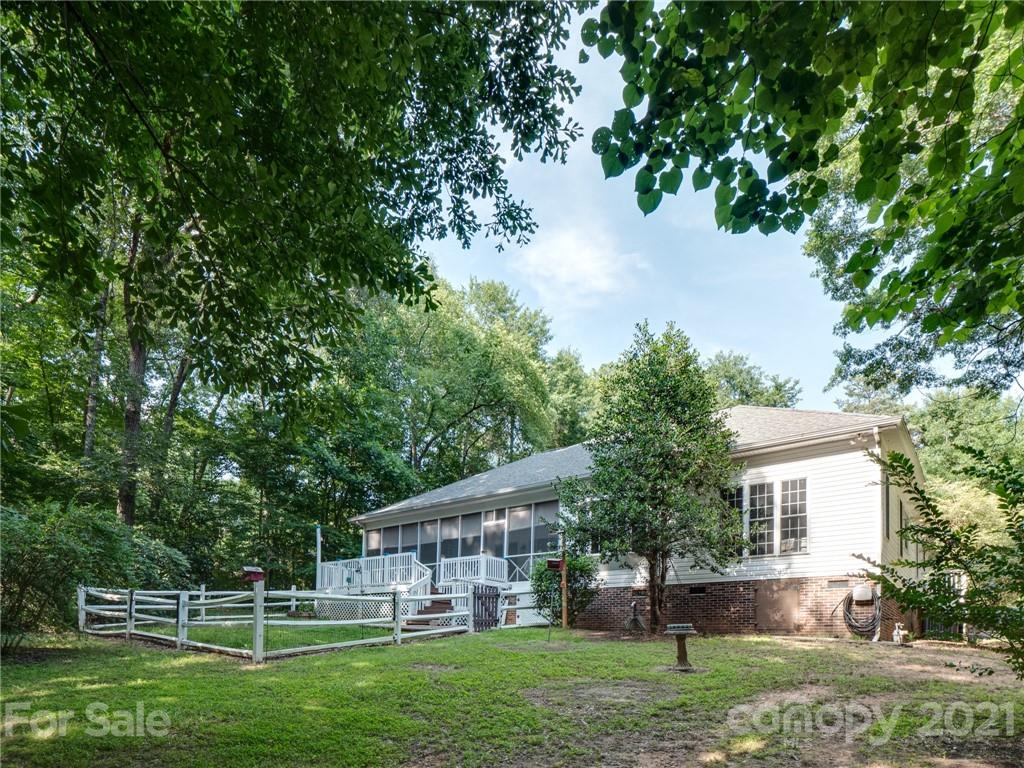 9141 Sunrise Meadow Road Fort Mill, SC 29715 - Photo 33 of 45 a view of a house with a yard