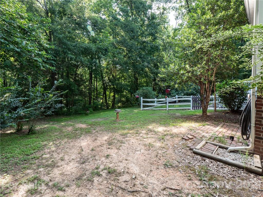 9141 Sunrise Meadow Road Fort Mill, SC 29715 - Photo 35 of 45 a view of a field with sitting area